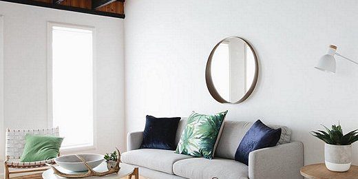 Room styling with neutrals and banana leaf pillow