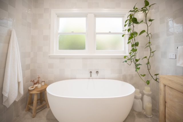 freestanding bath with timber stool